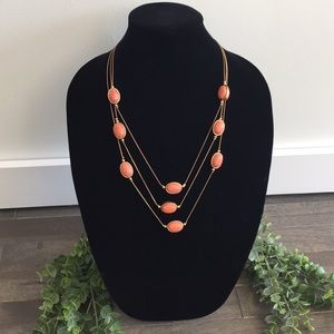 Gold and coral necklace